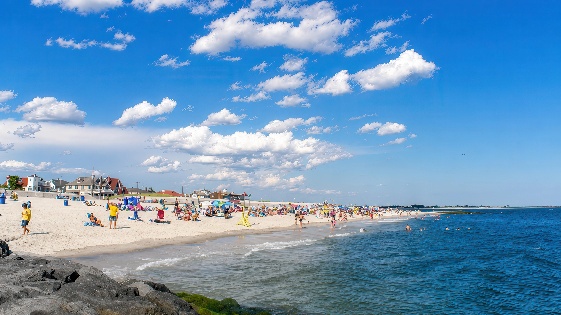Aerial view of Point Lookout beach, Reynolds Channel, and the waterfront near The Buoy Bar restaurant